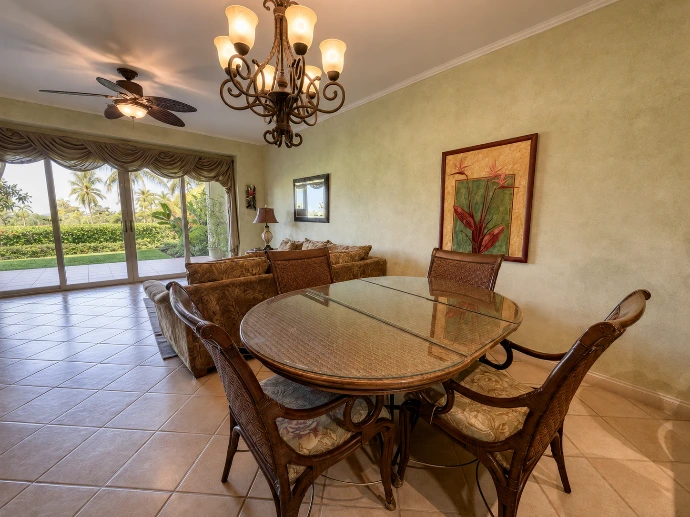 Warm dining room at Del Mar 4P, featuring garden-level views and a seamless connection to the tropical surroundings of Los Sueños Resort, Costa Rica.
